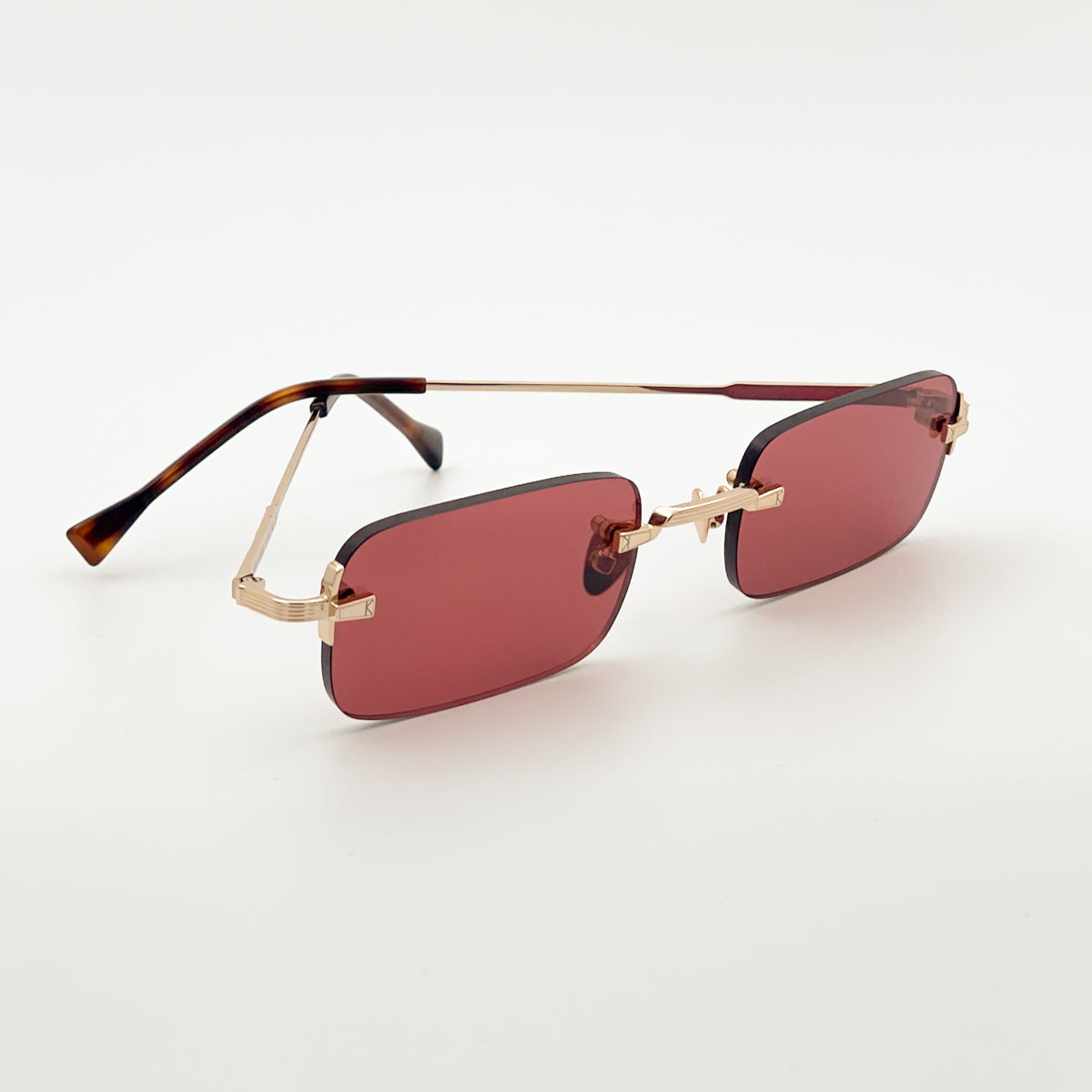 Kyme Silas occhiali da sole unisex design minimal oro rosso