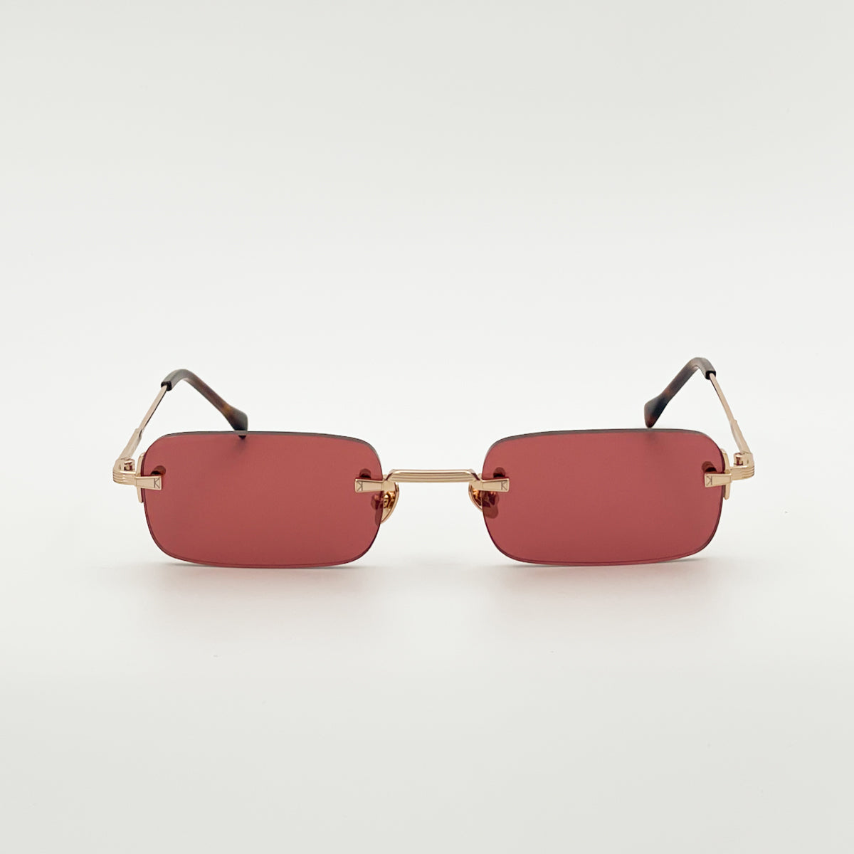 Kyme Silas occhiali da sole unisex design minimal oro rosso