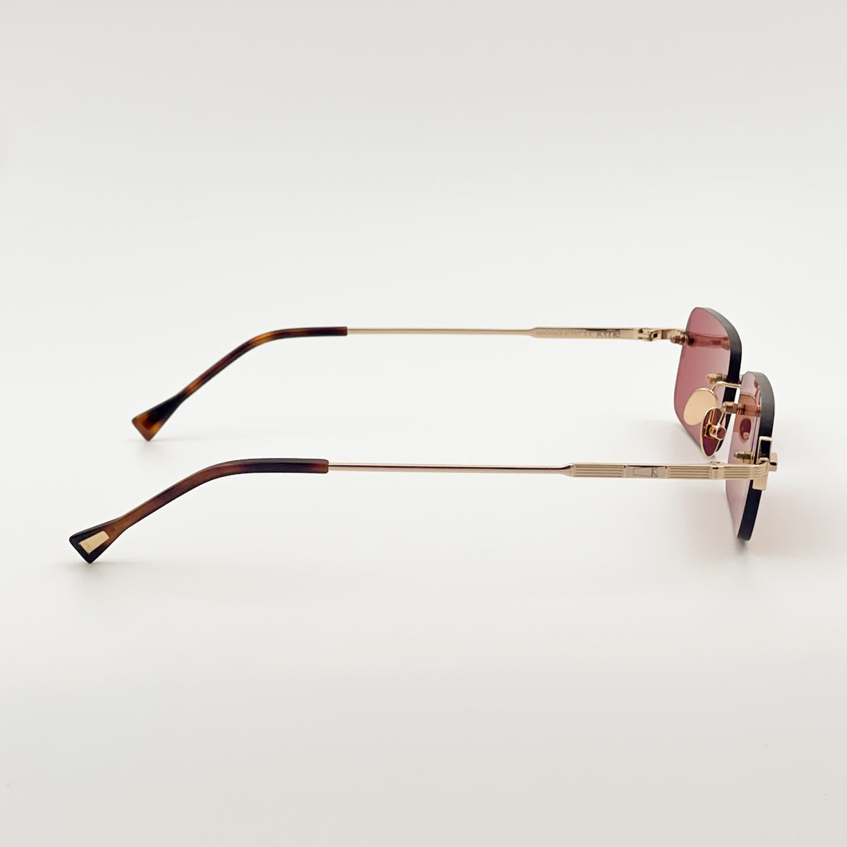 Kyme Silas occhiali da sole unisex design minimal oro rosso