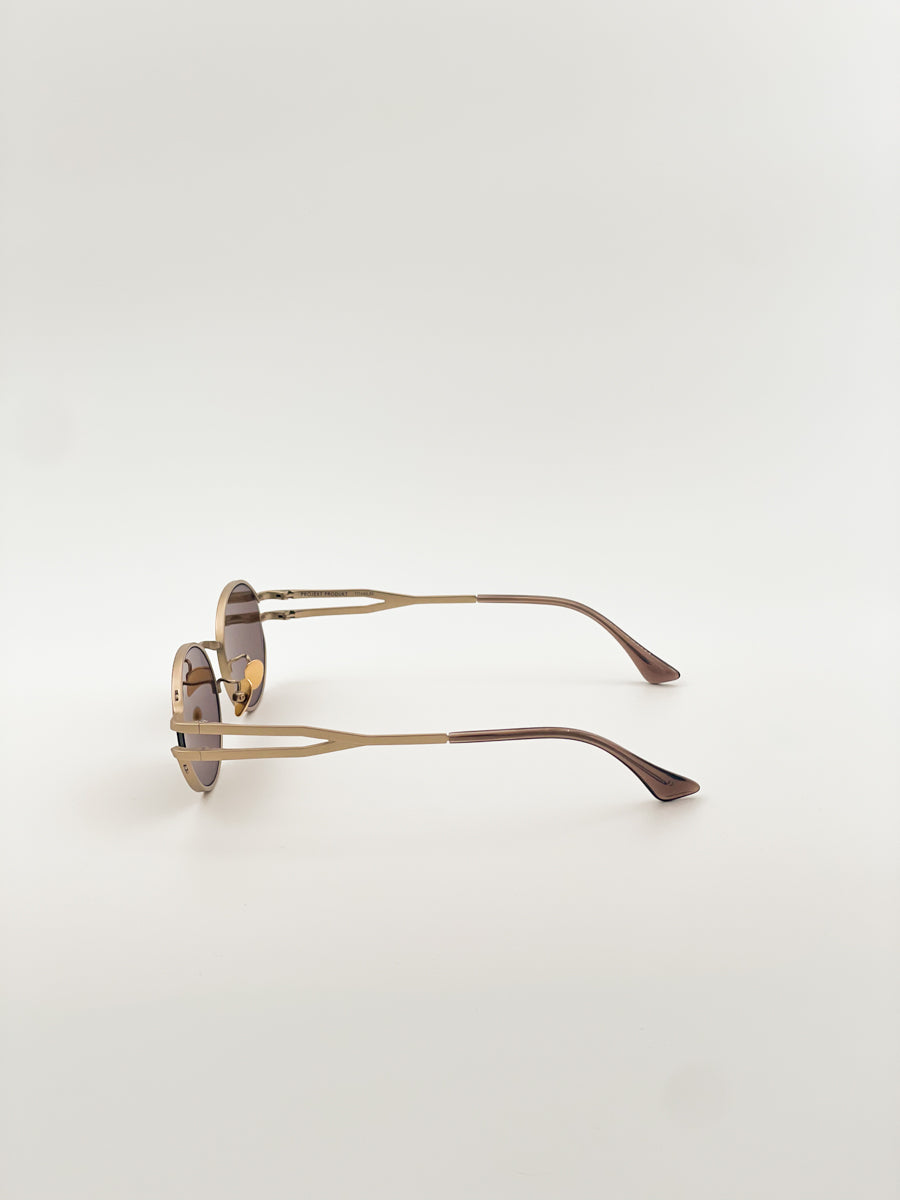 Projekt Produkt HM3 rocchiali da sole unisex montatura ovale in titanio spazzolato color oro bronzato