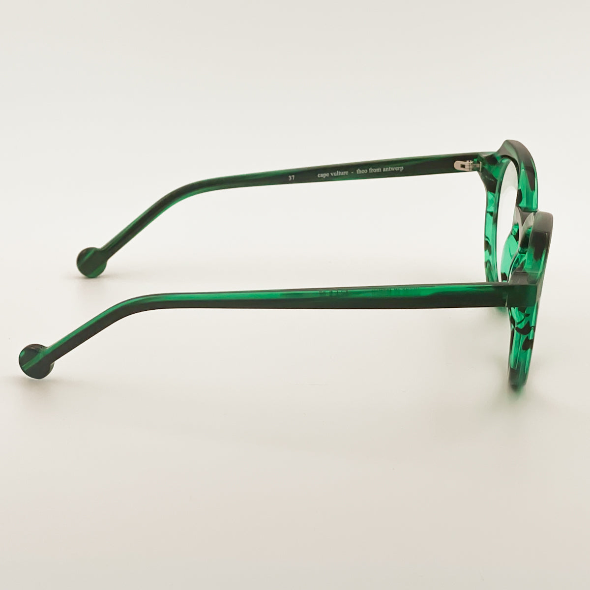 Theo Eyewear Cape Vulture Occhiale da vista da donna verde striato cateye rotonda